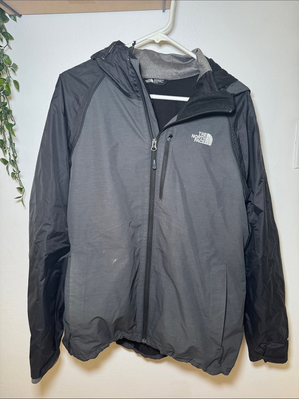 The North Face woman’s Black & Gray Hooded winter jacket
